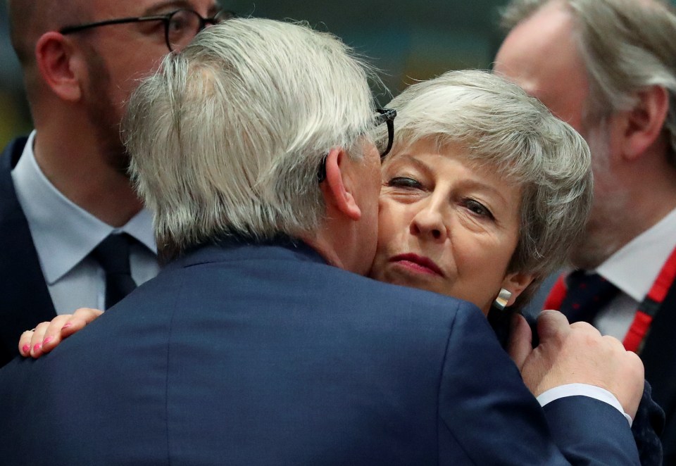  Theresa May greeting Jean-Claude Juncker in Brussels