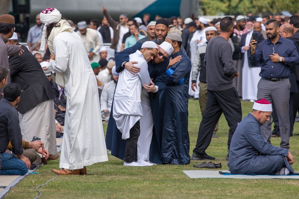 Muslims answer the call to pray at Hagley Park, opposite the Al Noor Mosque