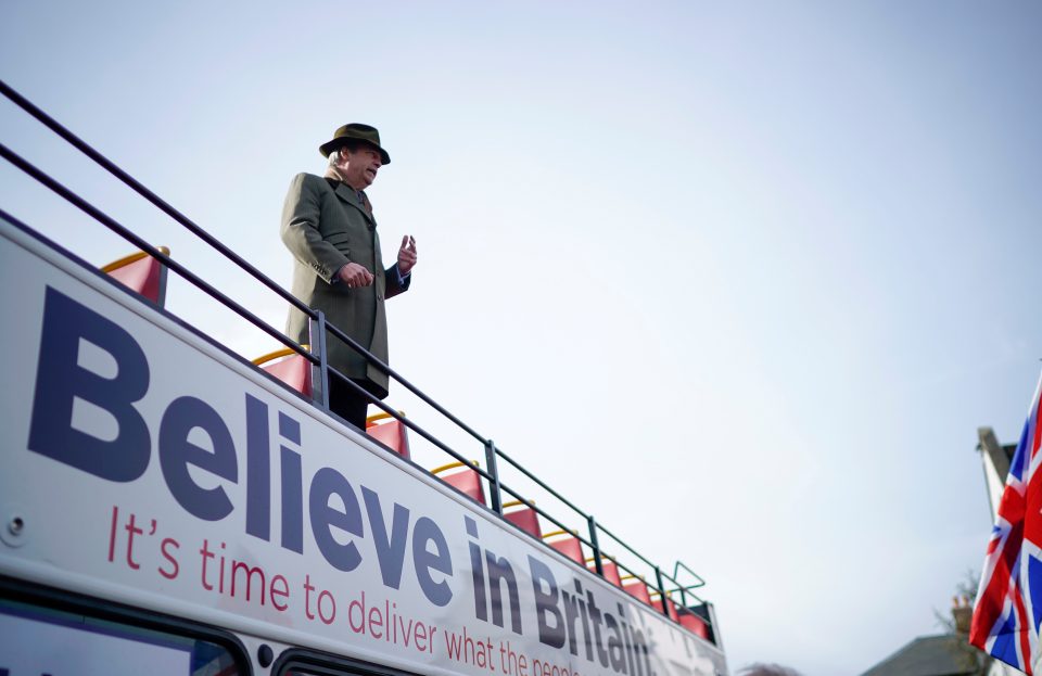  Farage addressed cheering marchers from the top of a double-decker open-top bus