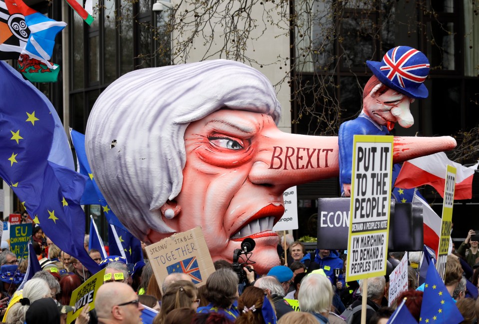  A doll resembling Theresa May stands among demonstrators during a Peoples Vote anti-Brexit march in London