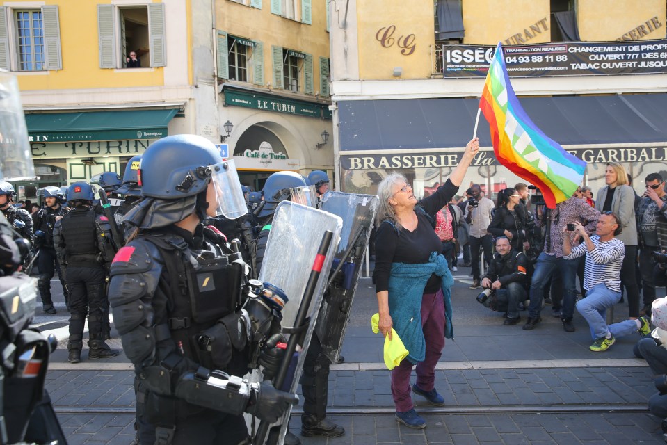  She was seen waving a flag during the demonstrations