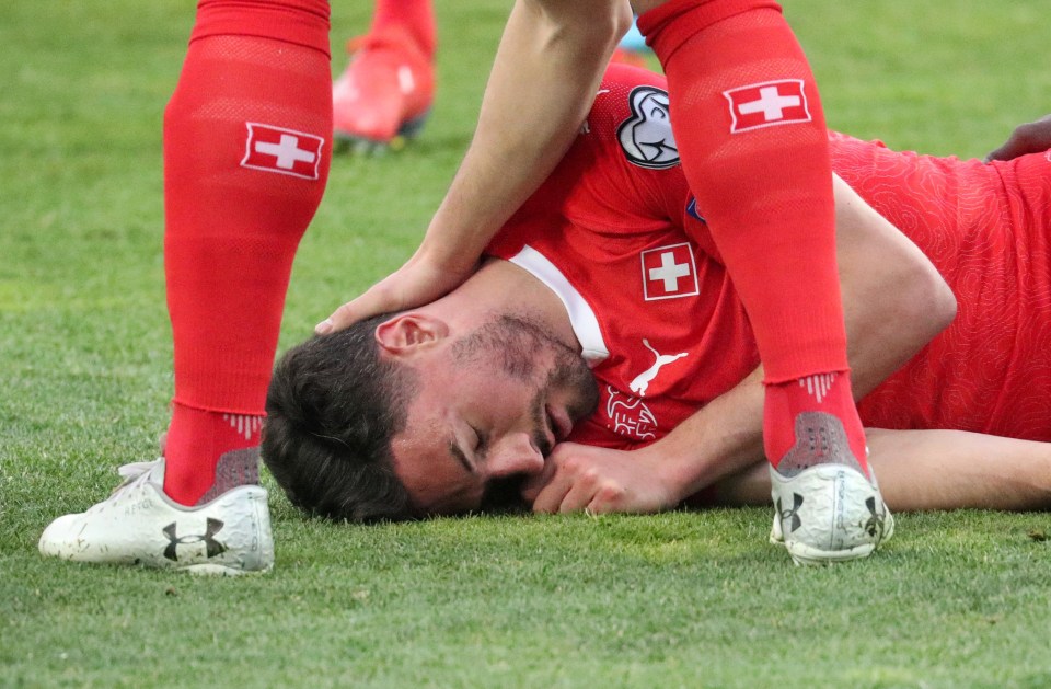 Fabian Schar was knocked out cold and rolled into the recovery position playing for Switzerland