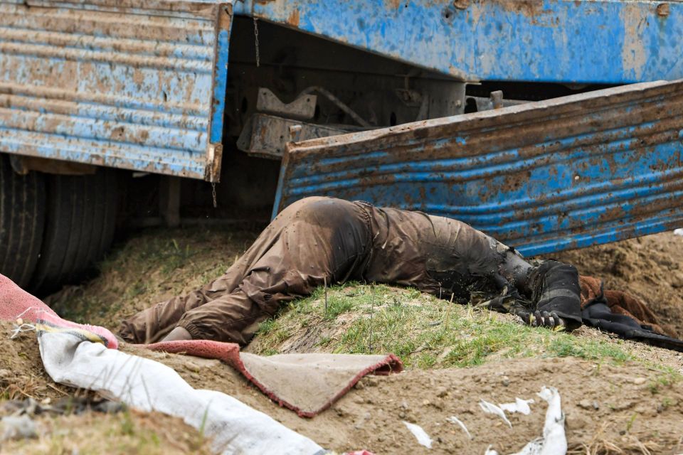  A dead ISIS fighter in Baghouz - the SDF said many were hiding in tunnels in the village