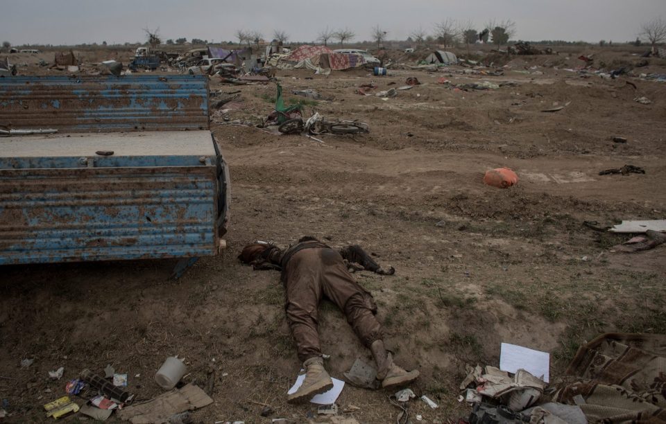  The body of an ISIS fighter lying on the ground