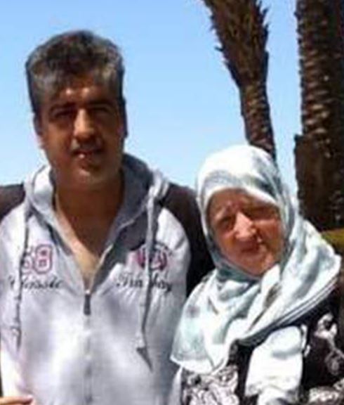  Kamel Darwish pictured with his mother who died from a heart attack the day after his funeral