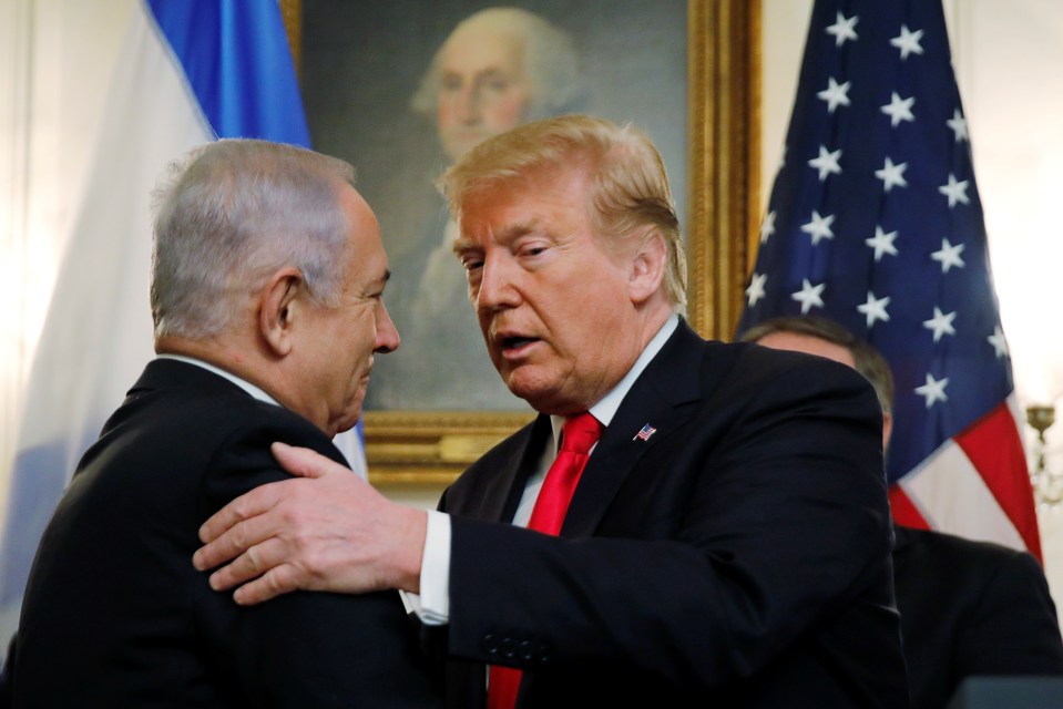  President Donald Trump embraces Israel's Prime Minister Benjamin Netanyahu