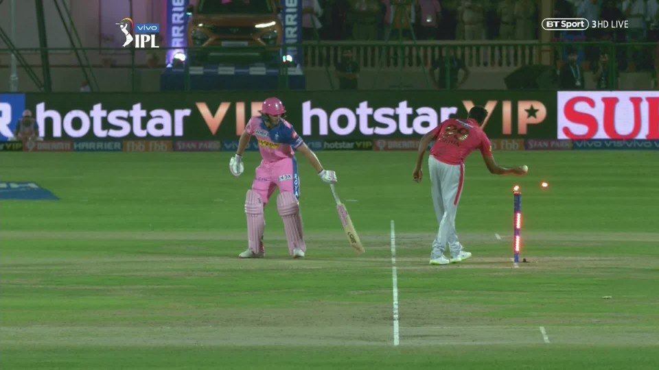  Ashwin was in full stride when he stopped and knocked off Buttler's stumps