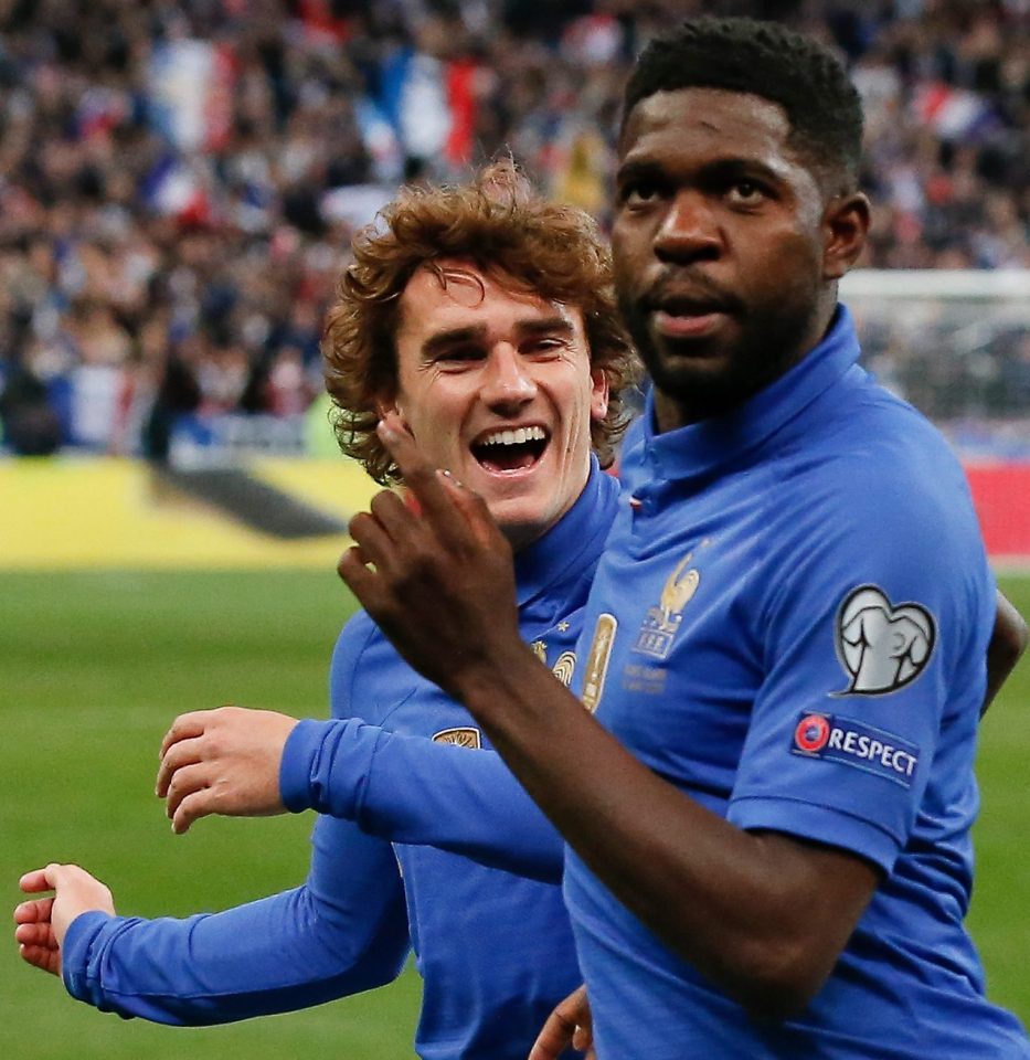  France defender Samuel Umtiti shares his goal joy with Antoine Griezmann, who later grabbed a glorious goal