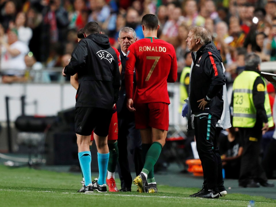  Cristiano Ronaldo limped off half hour into Portugal's clash with Serbia in Benfica