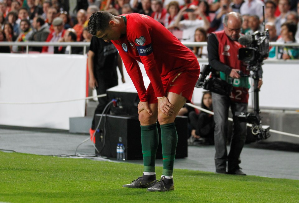  Cristiano Ronaldo hobbled off with an apparent hamstring injury for Portugal