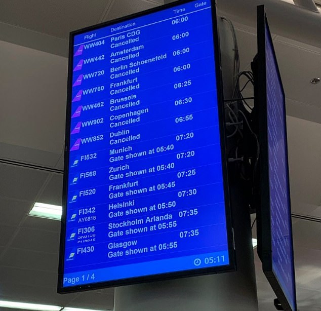  A departure board at Reykjavik Airport shows a series of cancelled WOW Air flights