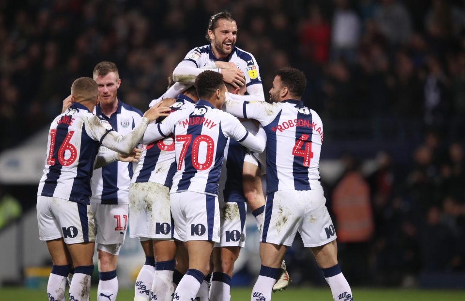  West Brom players celebrating Jake Livermore's goal