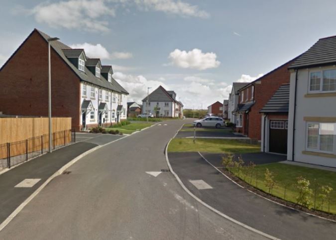  The baby died after being taken to hospital from an address in Fleming Court, Shevington in Wigan (general view, above)