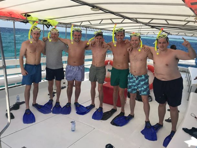  Greg and his wedding party pals smile for a snap on a boat trip