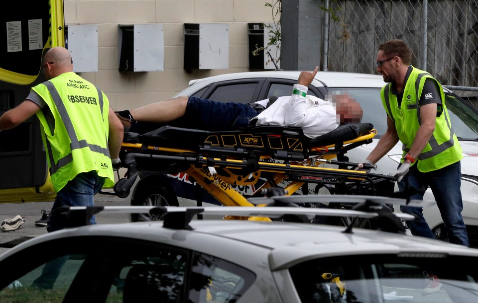  The gunman opened fire at a mosque in New Zealand killing multiple people. Paramedics are seen here taking the wounded to a Christchurch hospita