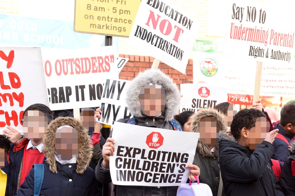  Parents and children demonstrate outside the Parkfield Community School against a gay awareness class