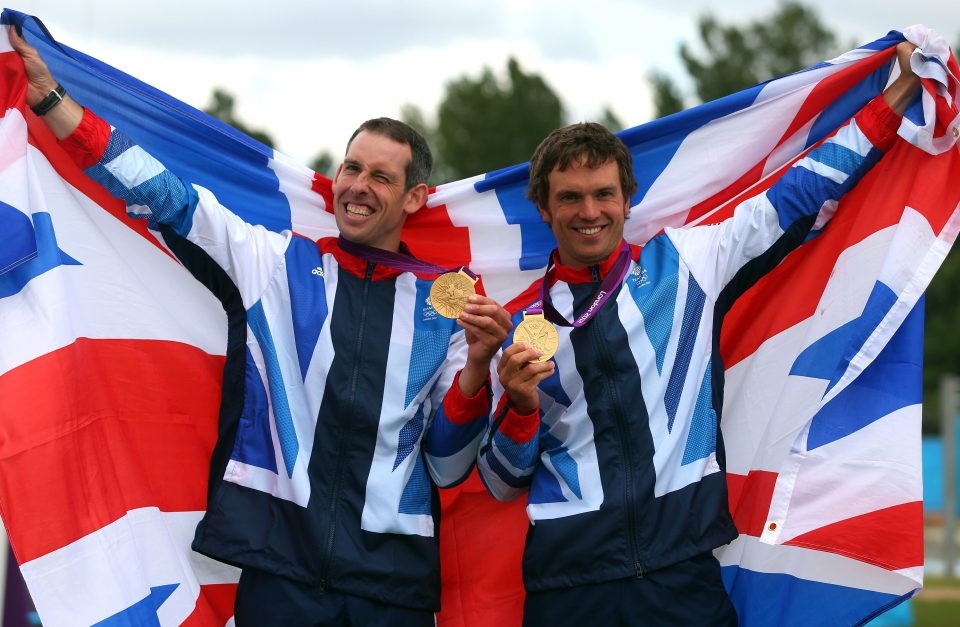  Stott poses with Tim Baillie after they won gold in London in 2012