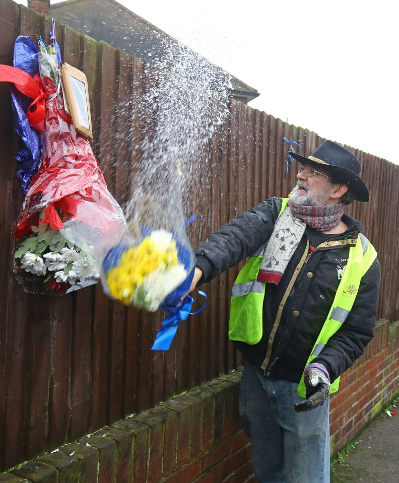  Raging vigilantes tore down floral shrines left to stabbed burglar Henry Vincent last April