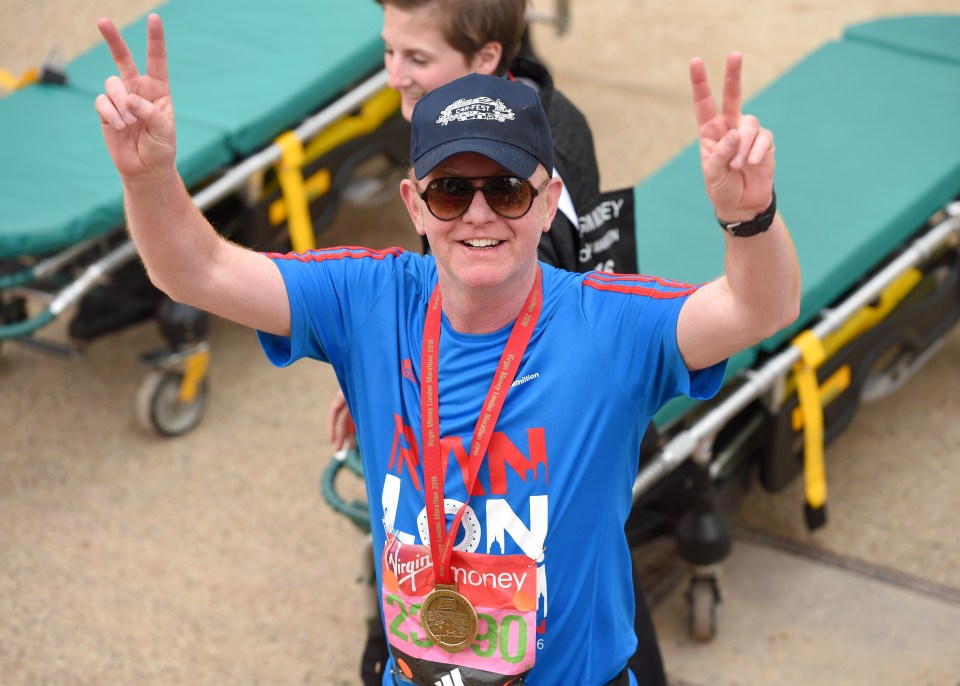  Chris Evans crosses the line in the London Marathon