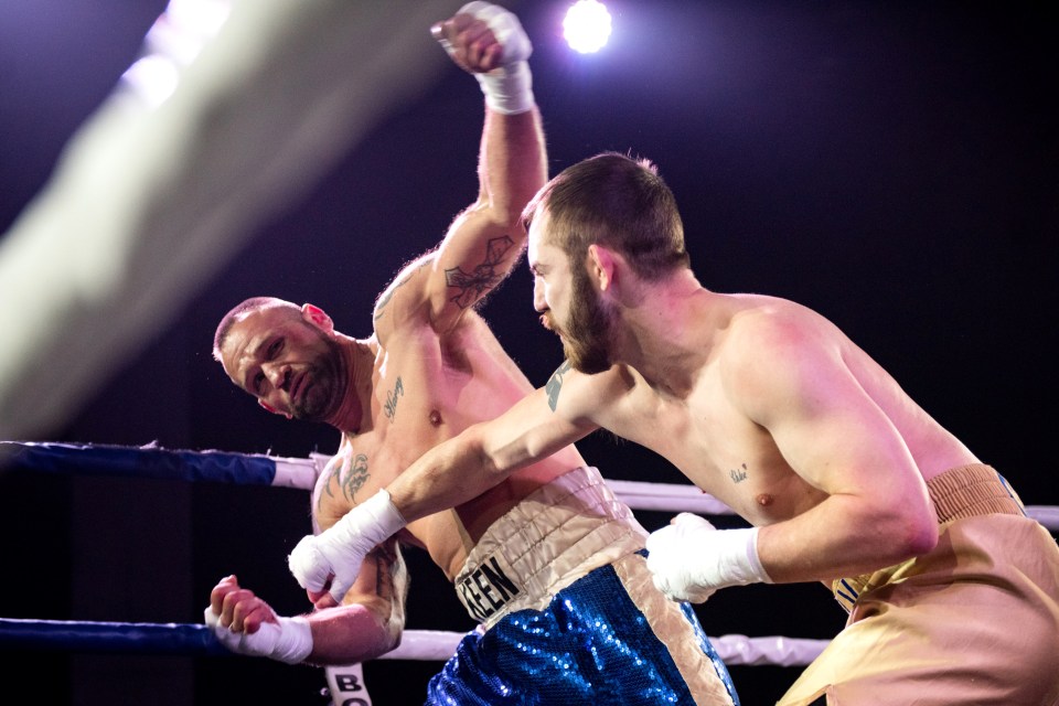  Boxers exchange blows in the ring during their bout in Trafford