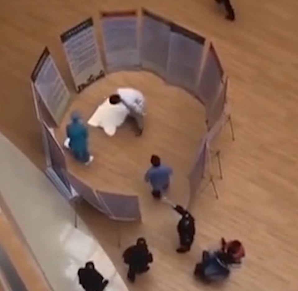  Staff erected screens around where the baby fell