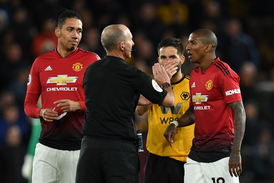  Ashley Young is given his marching orders by Mike Dean