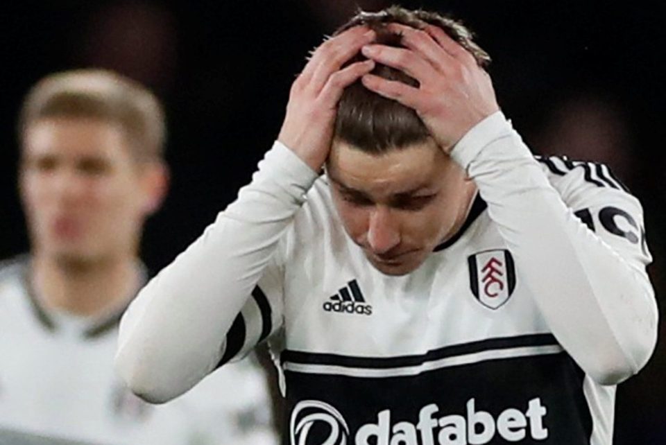  Tom Cairney shows Fulham's dejection as they slumped to a relegation-sealing defeat at Watford