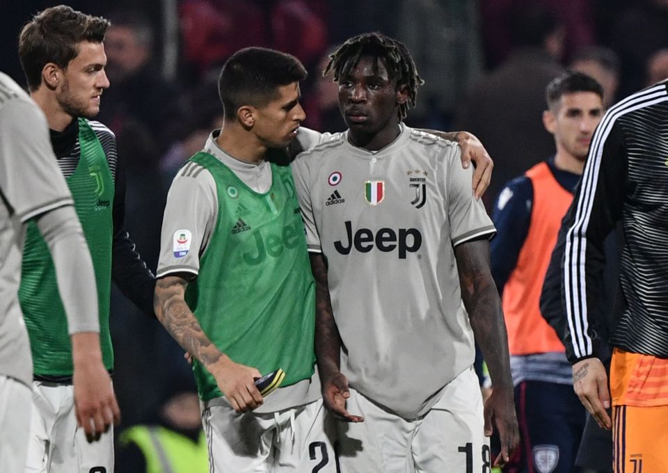  Moise Kean was supported by his team-mates after the game