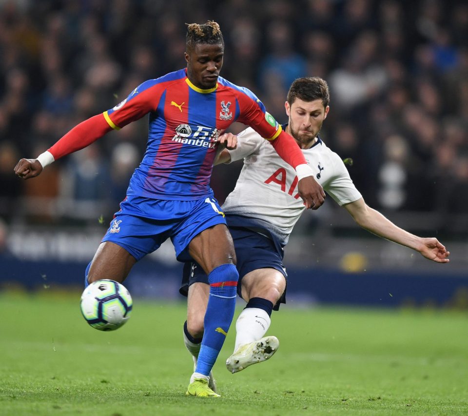  Ben Davies harries Palace dangerman Wilfried Zaha in the first ever Premier League game at the new Tottenham Stadium.