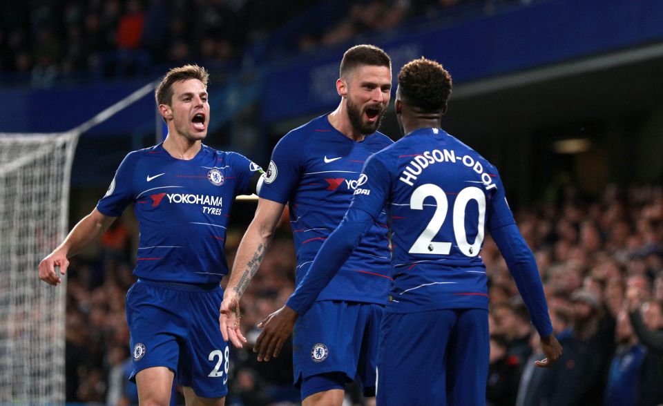  Olivier Giroud celebrates his opening goal after an assist from Callum Hudson-Odoi