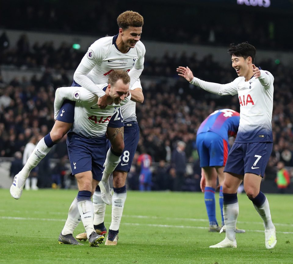  Dele Alli helps Christian Eriksen enjoy his goal as Spurs sealed a crucial win