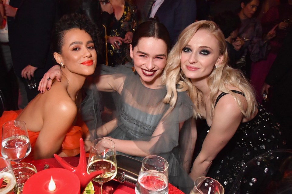  Nathalie Emmanuel, Emilia Clarke and Sophie Turner enjoy a moment at the party