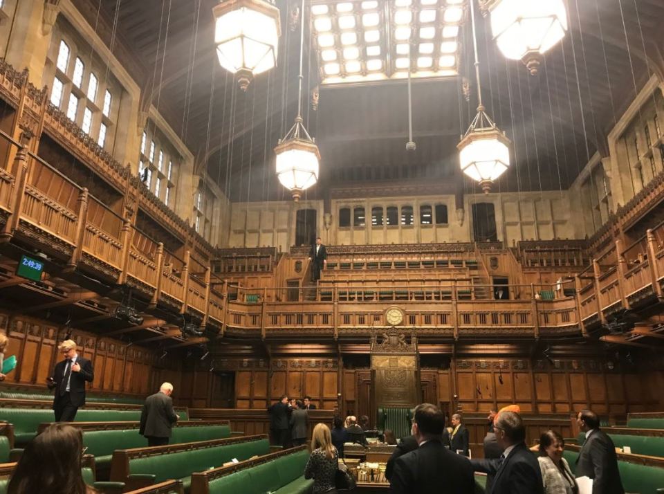  MPs exiting the Commons chamber during a water leak