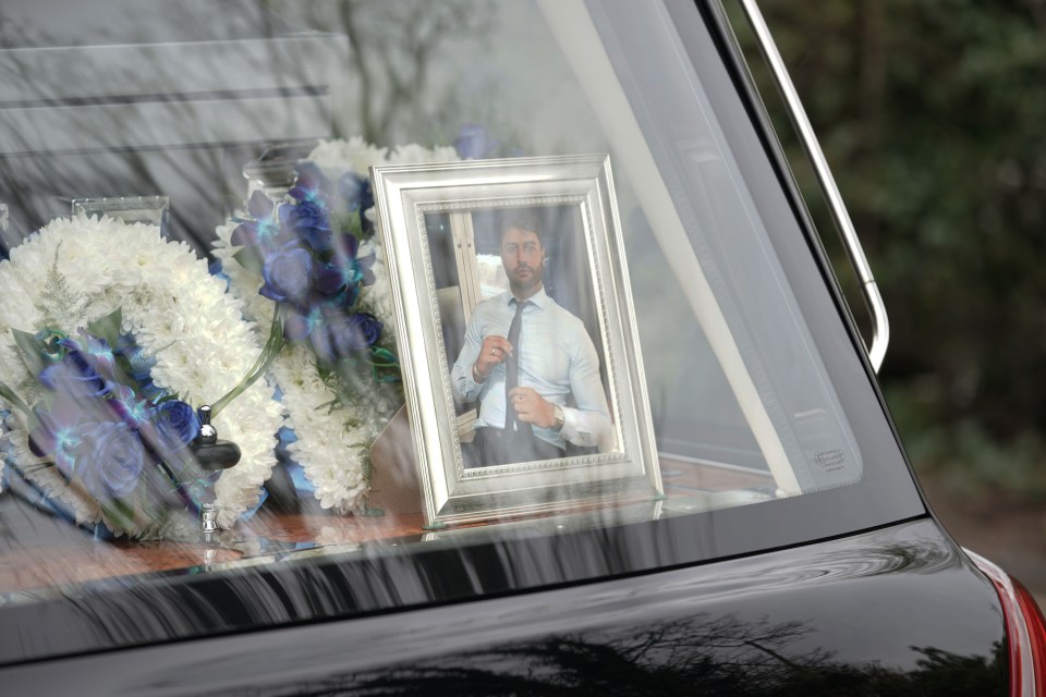  Tributes to Mike were seen inside the hearse this afternoon