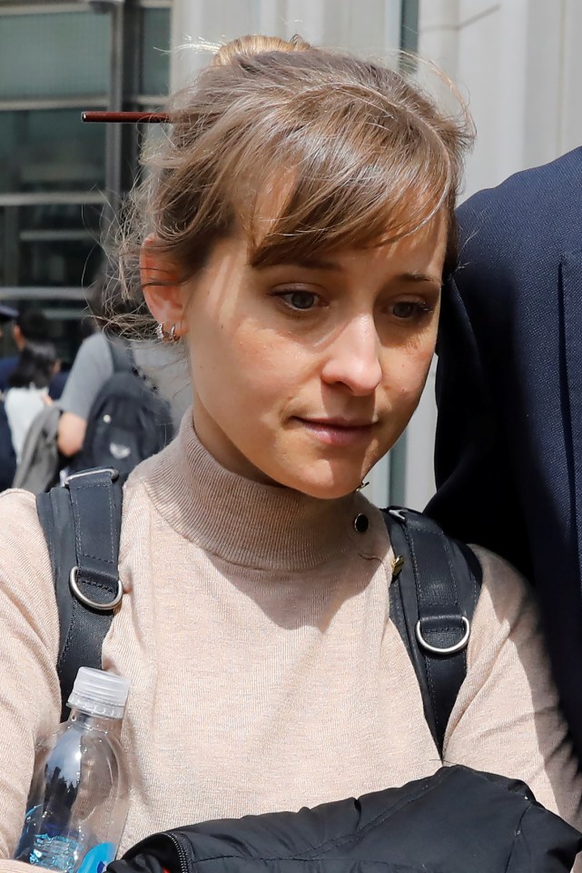  Actress Allison Mack leaves the Brooklyn Federal Courthouse after facing charges regarding sex trafficking and racketeering related to the NXIVM cult case