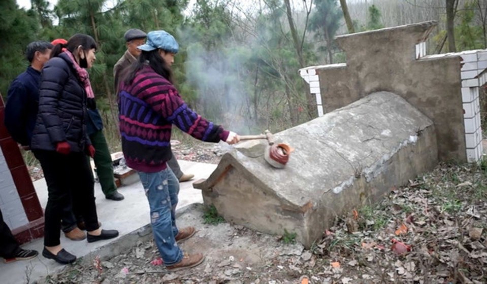 The Beijing-based artist exhumed his father’s remains for the photo shoot