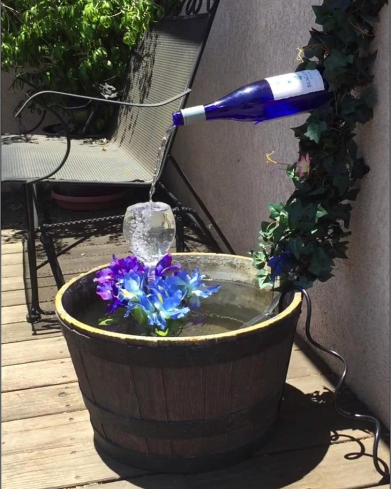  Wine fans will love this bottle pouring themed water feature