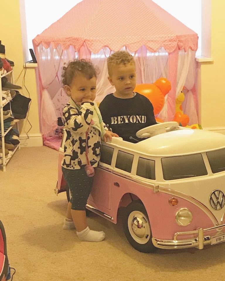  KaiBo, two, and 10-month-old Zian can also play in a cool pink Volkswagen campervan