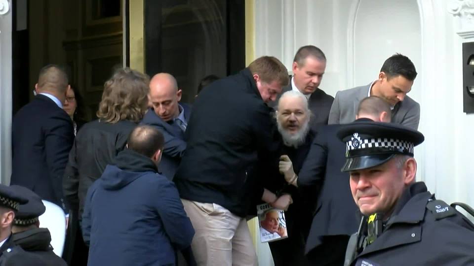  Julian Assange was dragged out of the Ecuadorian Embassy by cops after they withdrew asylum status today