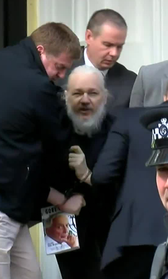  Cops pulled Julian Assange from the embassy this morning