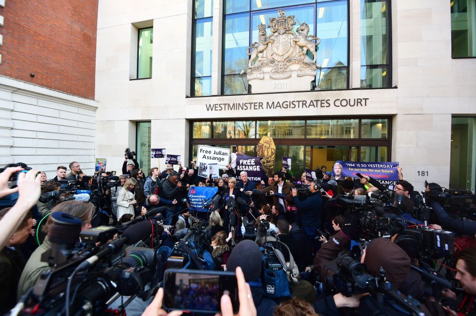  A huge pack of supporters and media converged outside Westminster Magistrates' Court