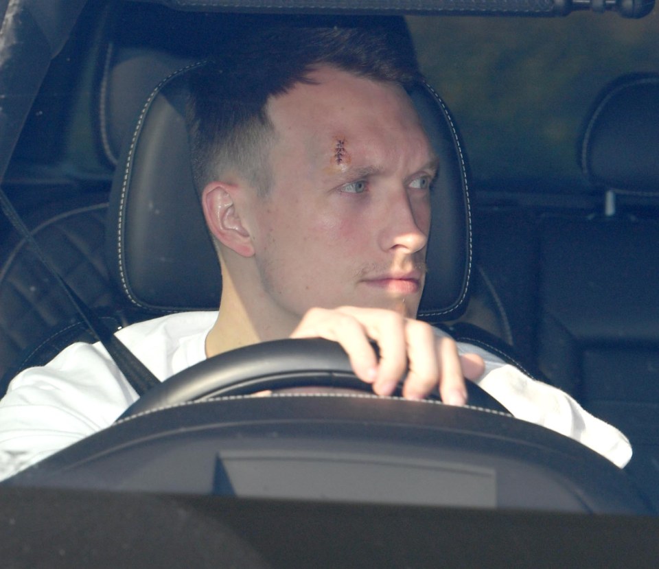  Phil Jones showed off stitches as he arrived at Man Utd's training ground