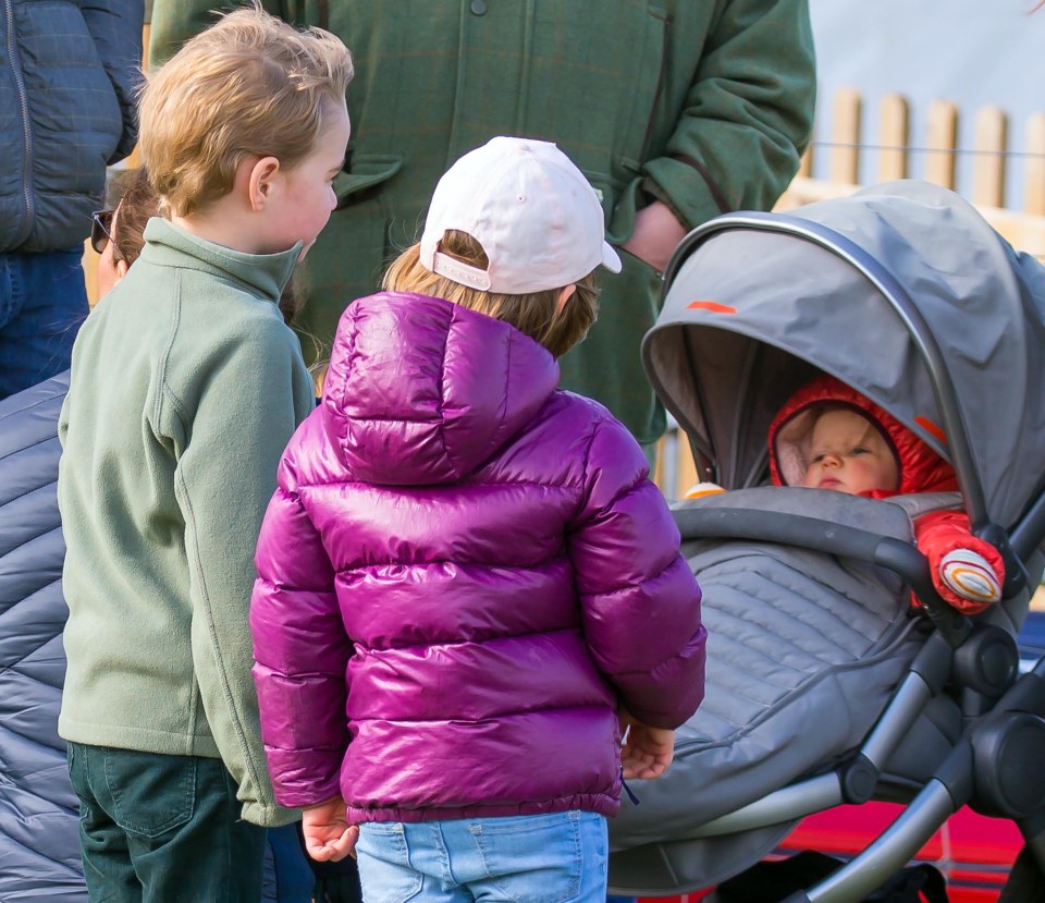  Prince George and Mia look over nine-month-old baby Lena Tindall