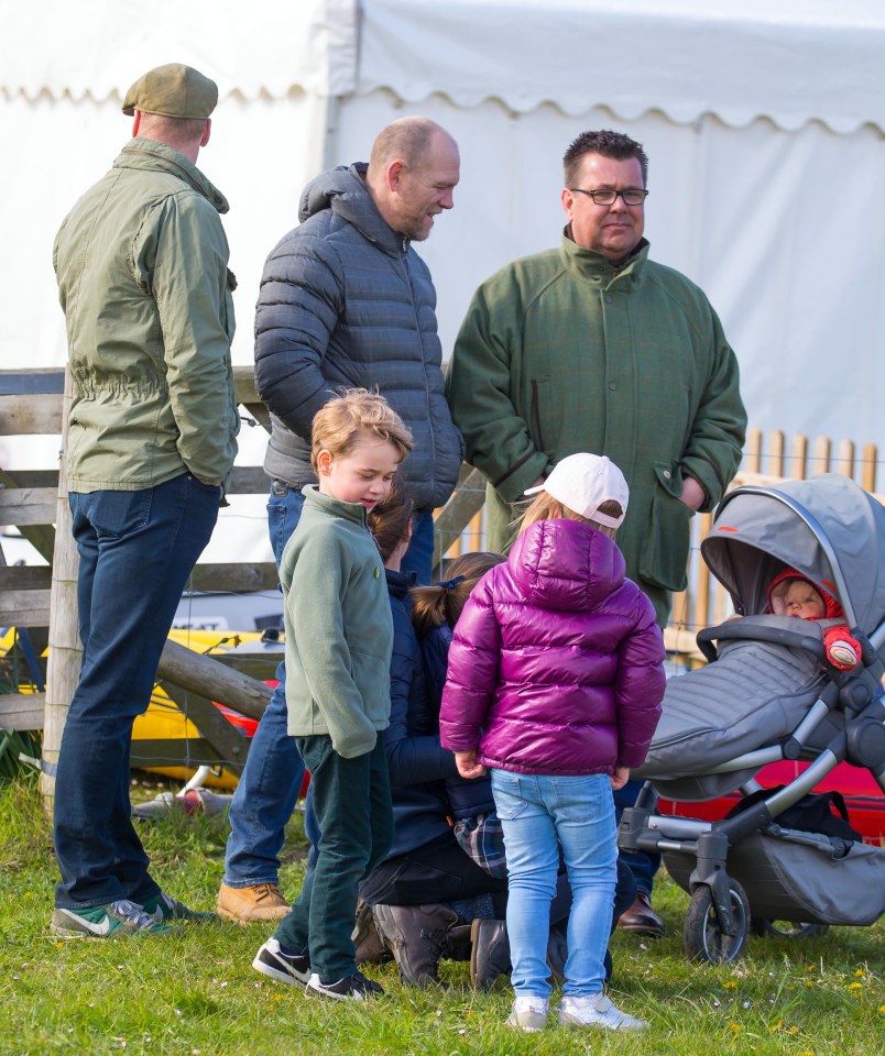  Mia was dressed in a stylish purple puffer jacket while George wore a pair of Nikes