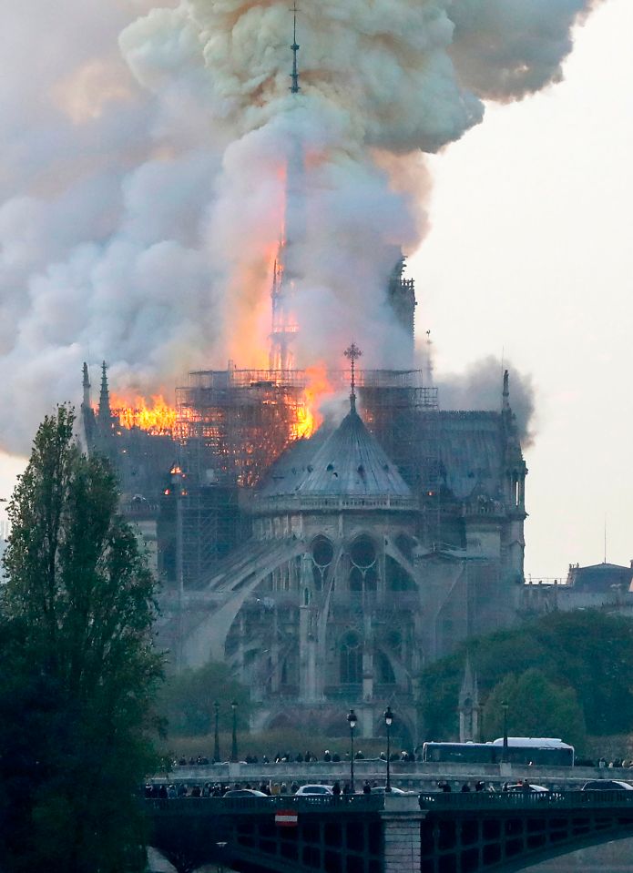  The fire erupted at the top of the medieval church this evening