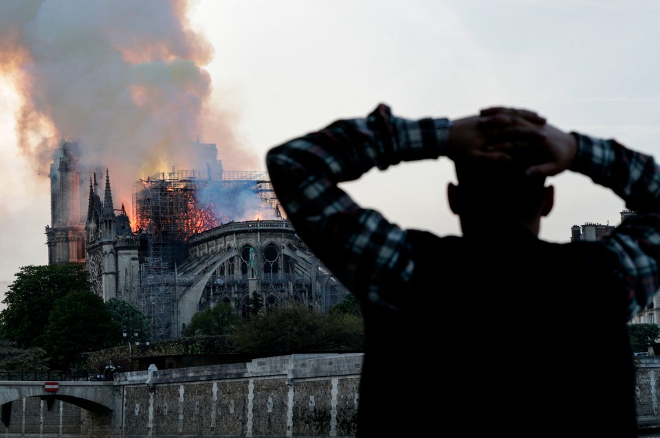 Stunned tourists have seen thick plumes of smoke filling the sky around the French capital