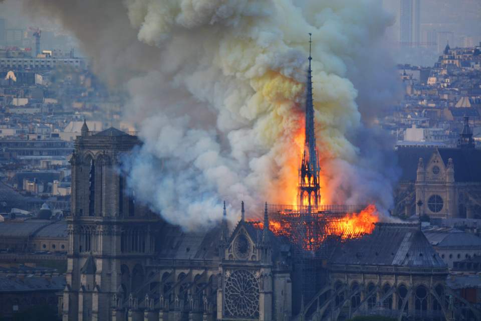  A 'stray flame in the building's roof caused the inferno, an emergency services source said