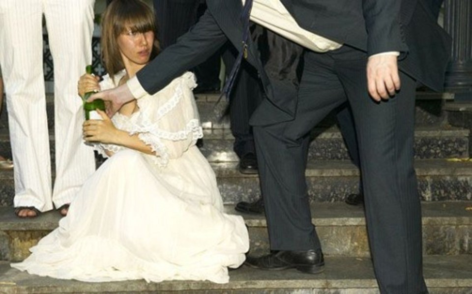  This bride does not want to give up that bottle