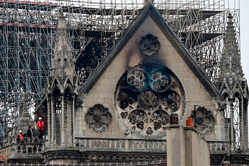 Inspectors survey the damage to the cathedral