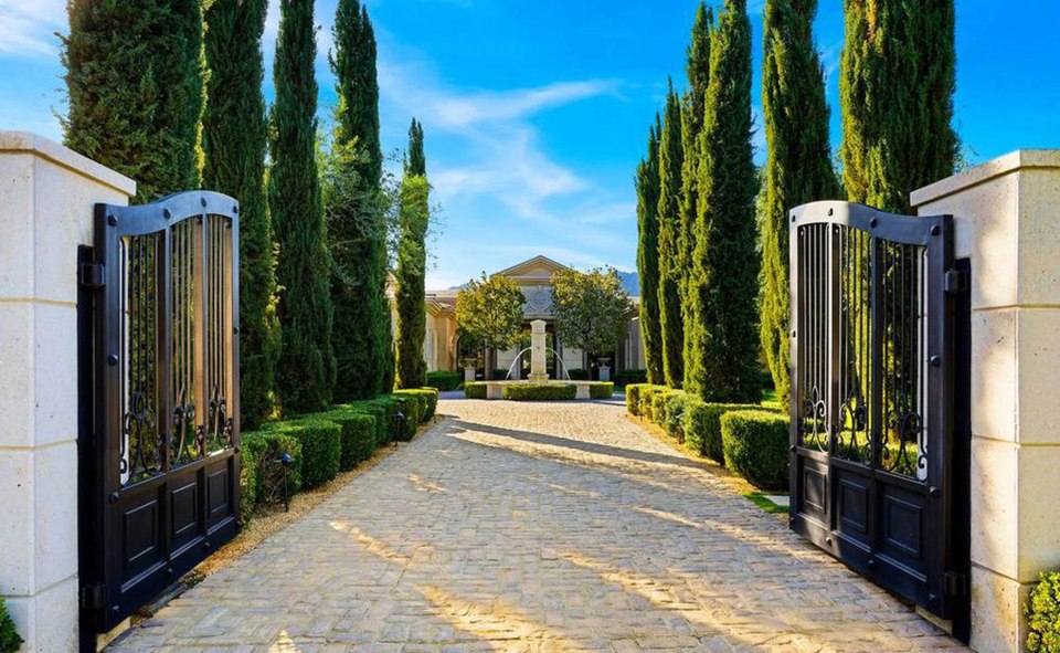  All the couple's cars will look at home going up this driveway